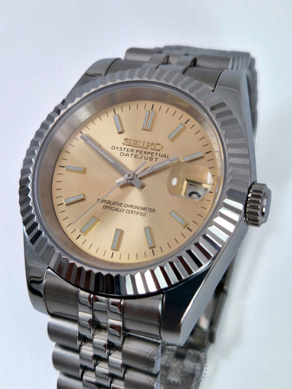 Datejust mod with champagne dial and Jubilee bracelet